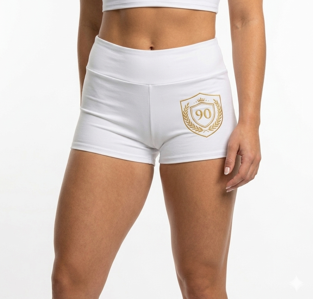Ninety Minute | Gold Crest Logo Yoga Shorts | Women’s Low-Rise Active Shorts - White