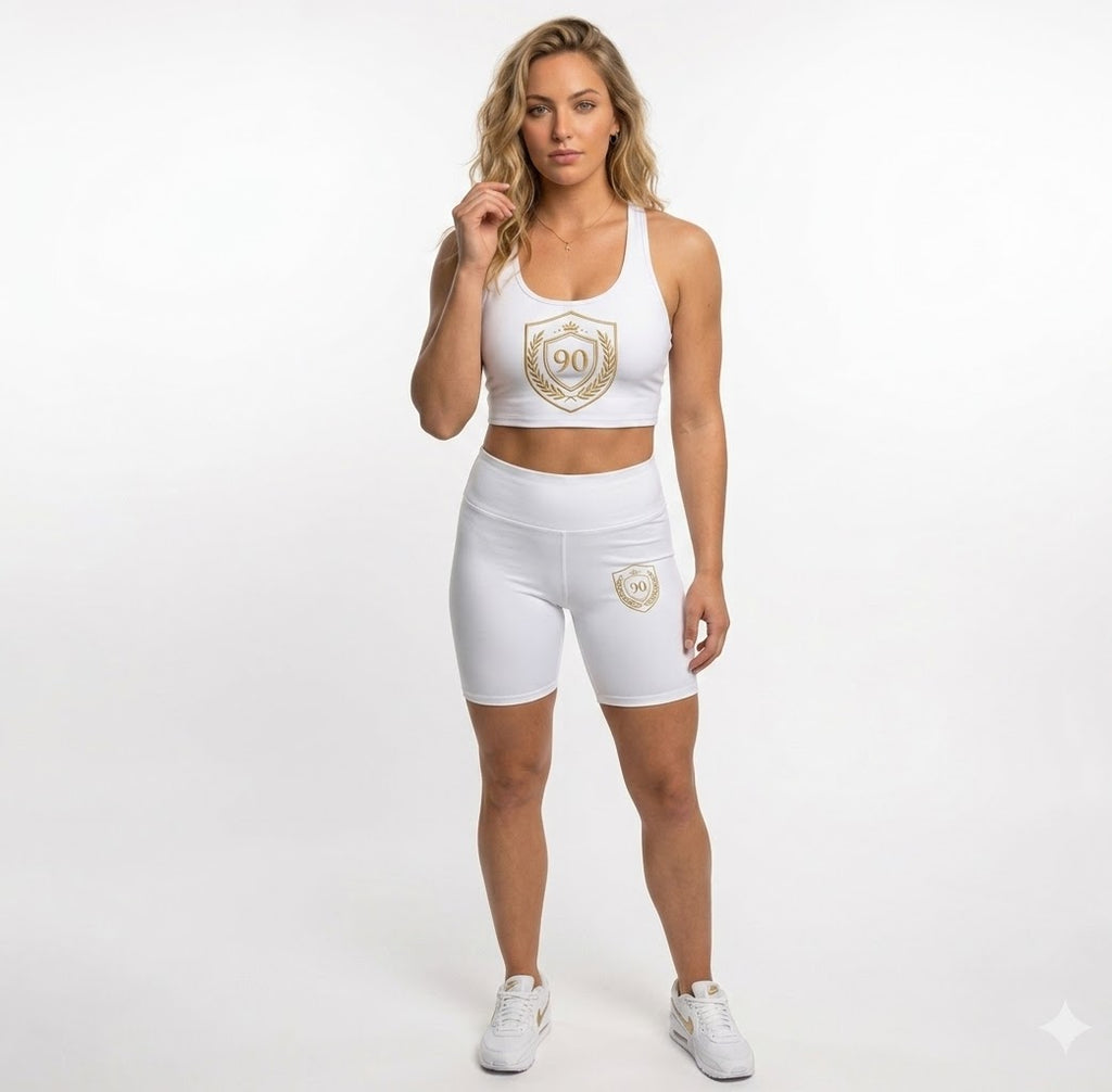 Ninety Minute | Gold Crest Logo Biker Shorts | Women’s Mid-Rise Active Shorts - White