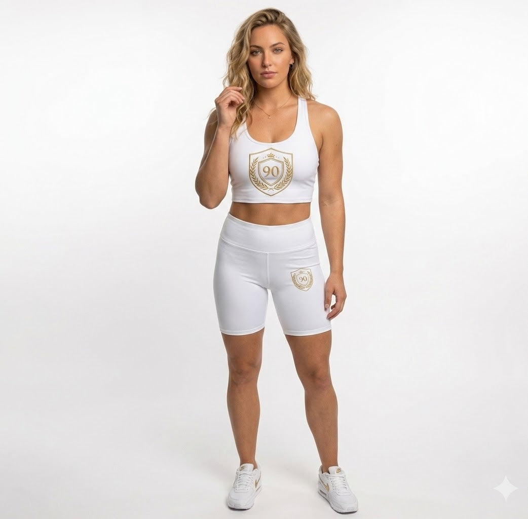 Ninety Minute | Gold Crest Logo Biker Shorts | Women’s Mid-Rise Active Shorts - White