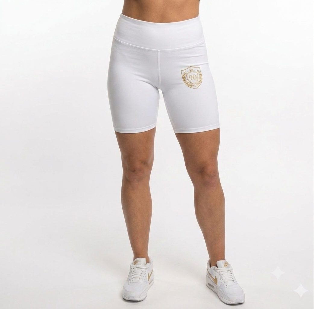 Ninety Minute | Gold Crest Logo Biker Shorts | Women’s Mid-Rise Active Shorts - White
